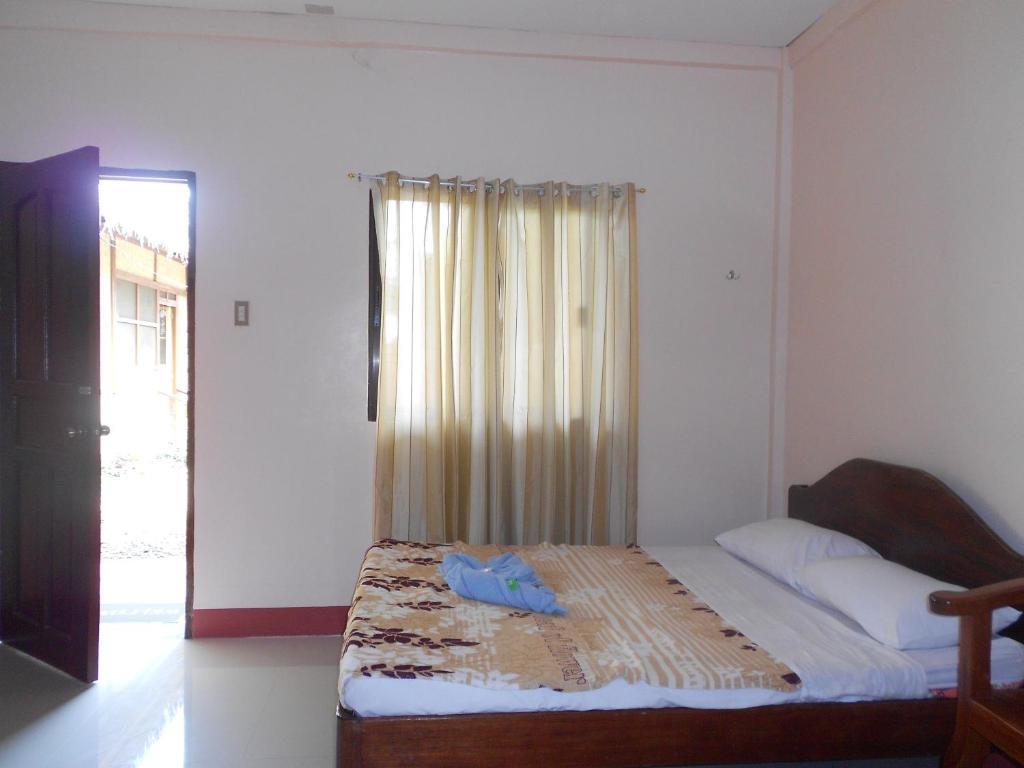 Tia Mers Guest House Puerto Princesa Chambre photo